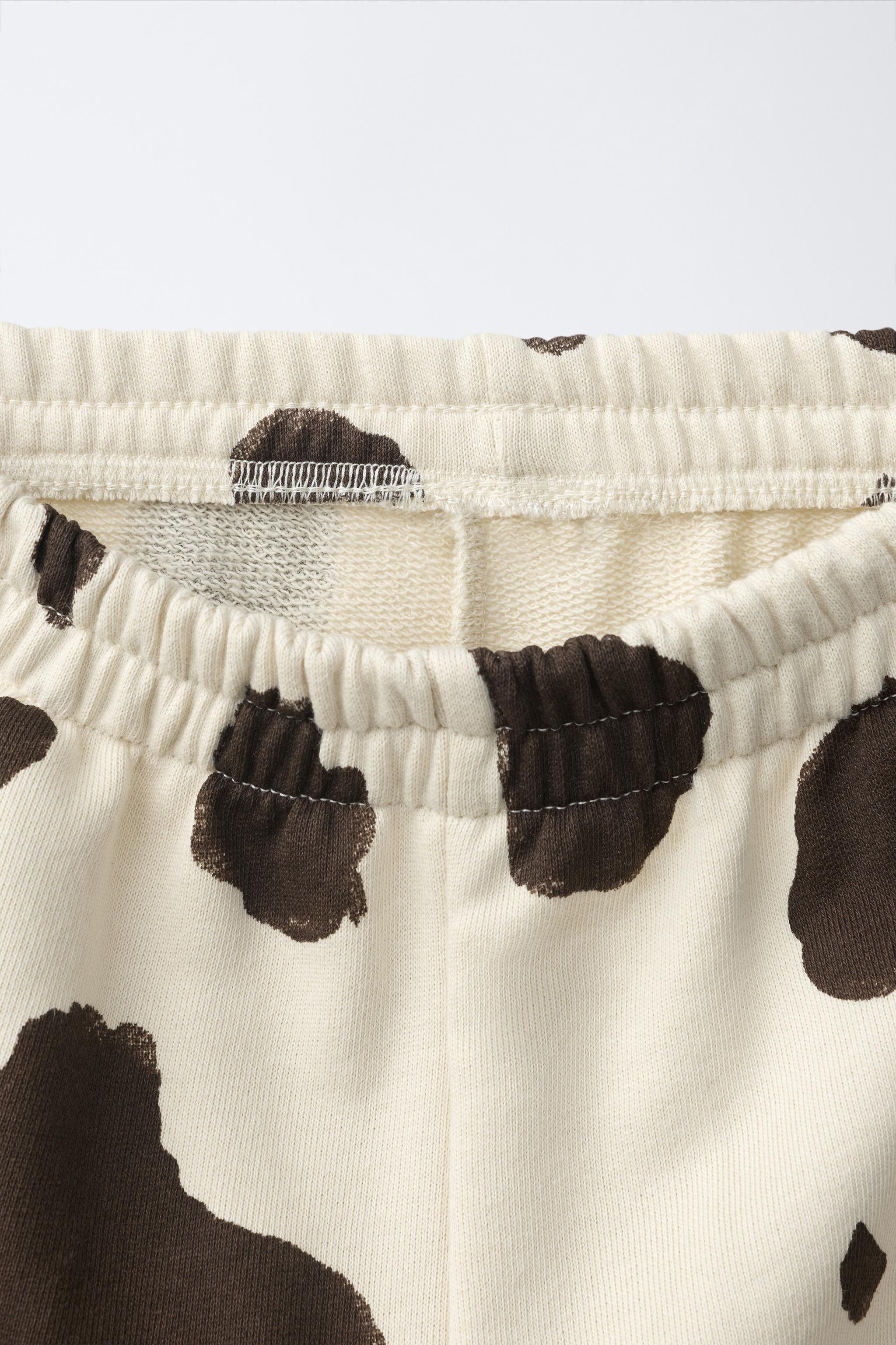 PANTALON EN MOLLETON IMPRIMÉ VACHE